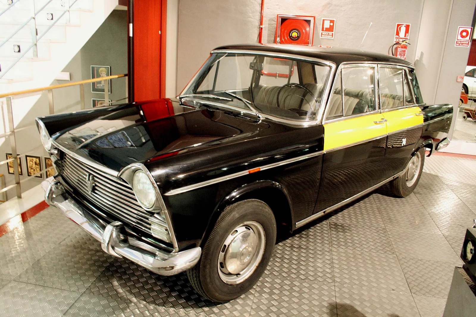 An official black and yellow Barcelona taxi