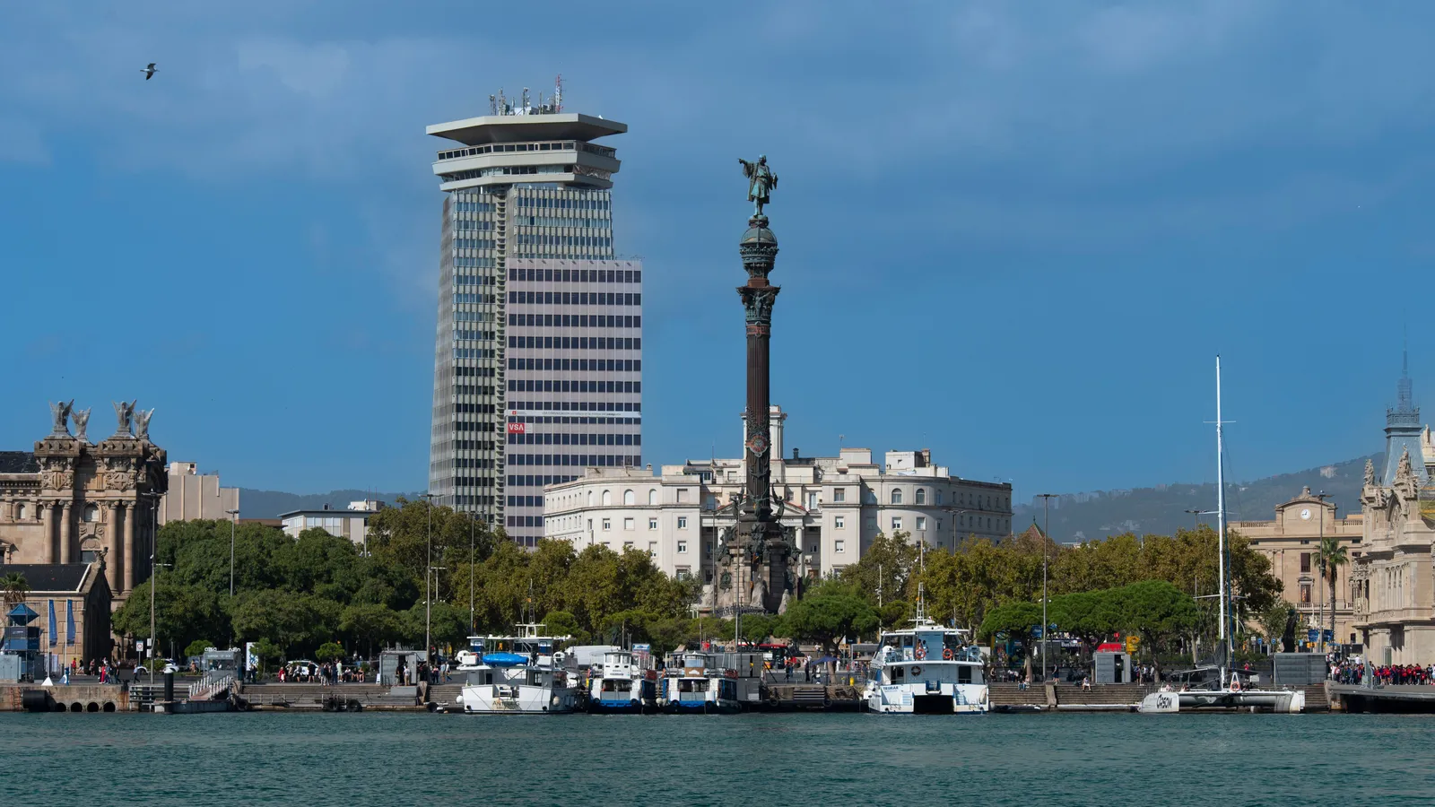The Columbus monument at the foot of La Rambla in Barcelona, seen from the harbour in daylight