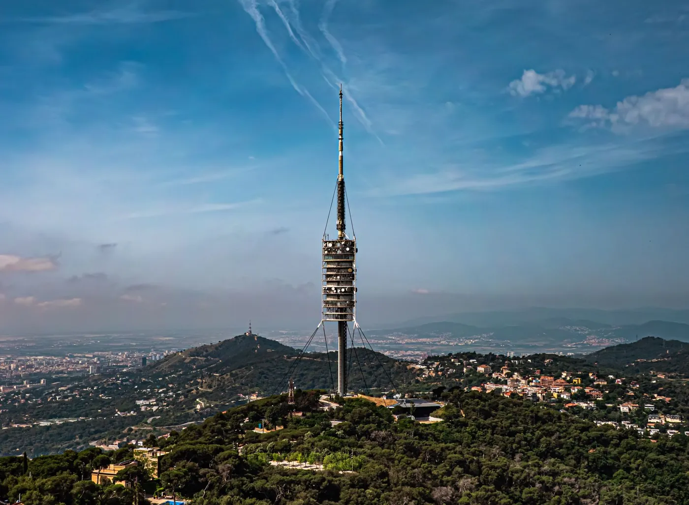 The Torre de Collserola on the wooded ridge above Barcelona, with the city spread out below, Spain