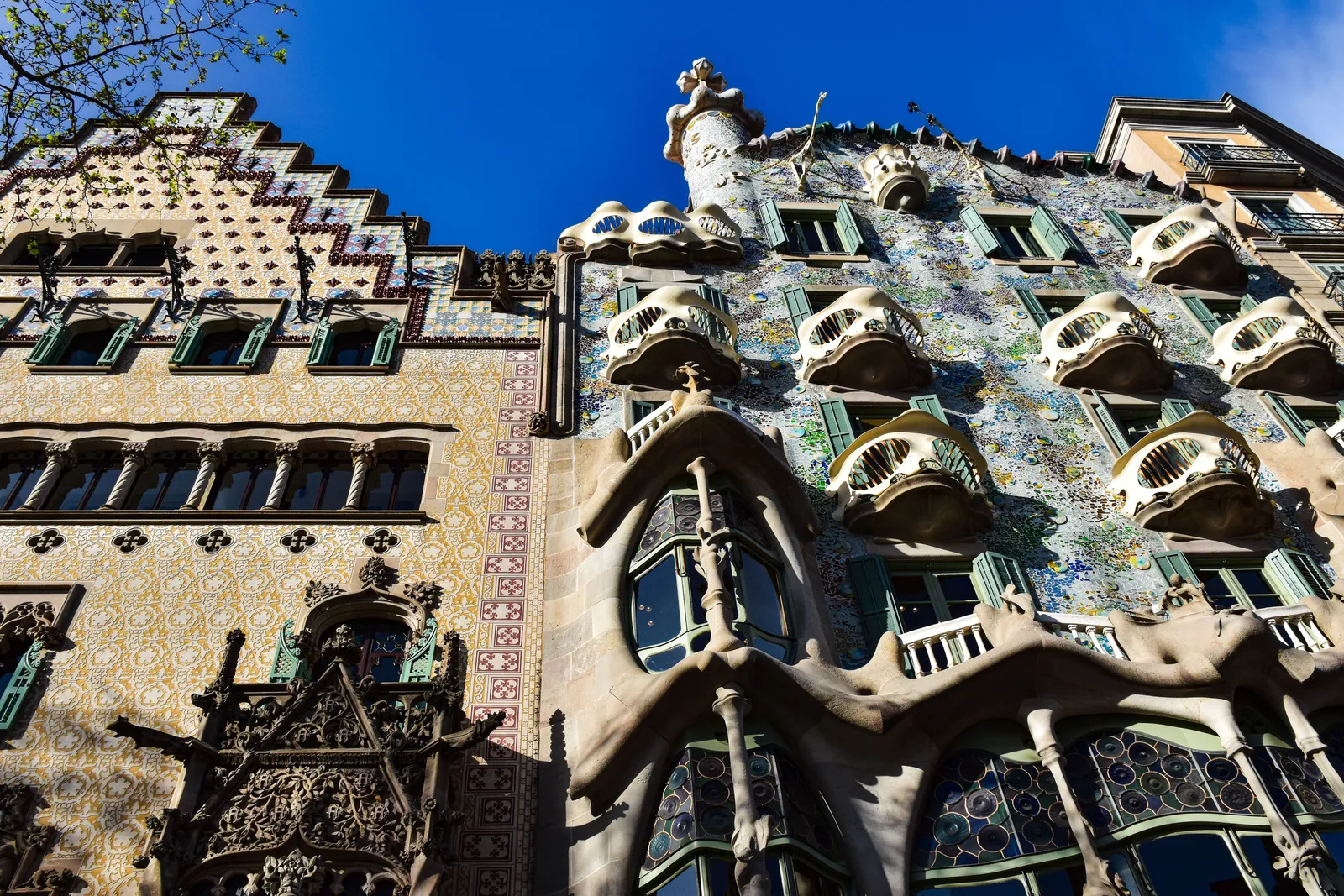 The spires of the Sagrada Família rising above Barcelona in daylight
