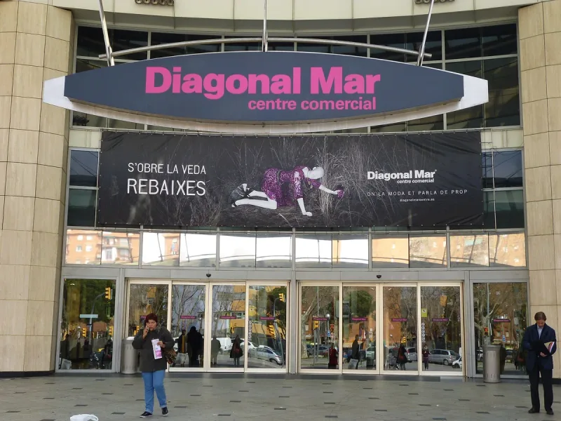 Shopping centre entrance with a Diagonal Mar sign above glass doors